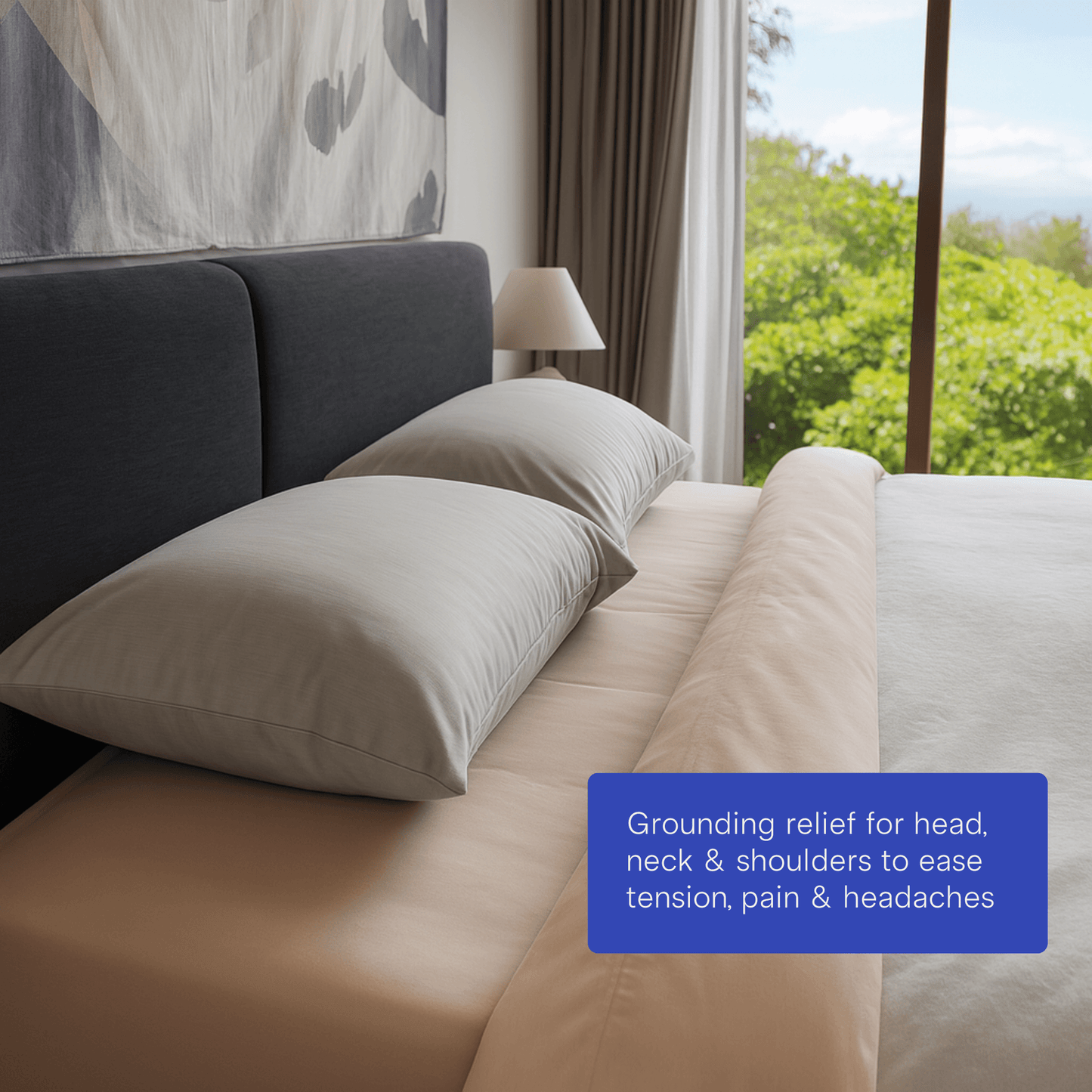 grounding pillows on bed with tree in background