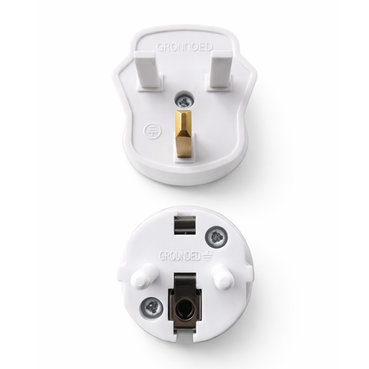International Plug for safe grounding connection with UK or EU wall sockets, compact and travel-friendly.