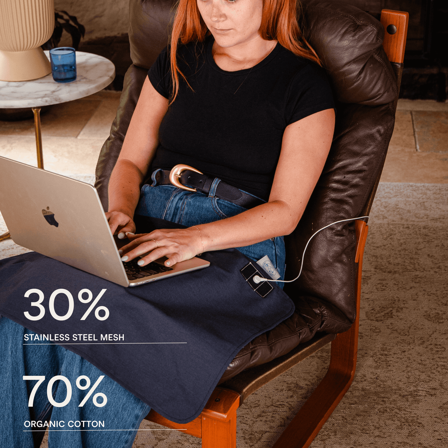 women on computer whilst grounding