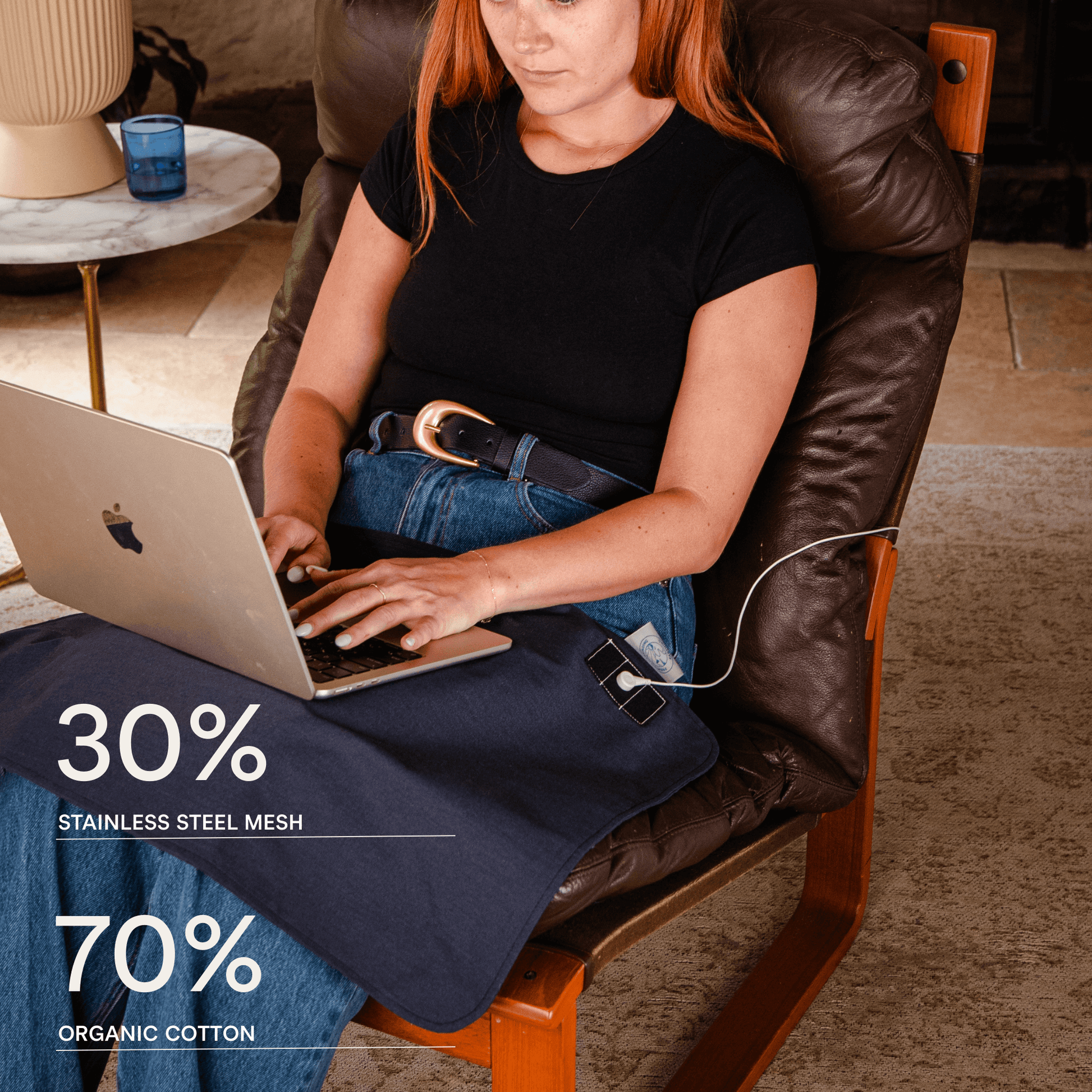 women on computer whilst grounding