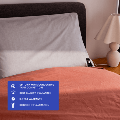 grounding pillowcase on bed with lamp