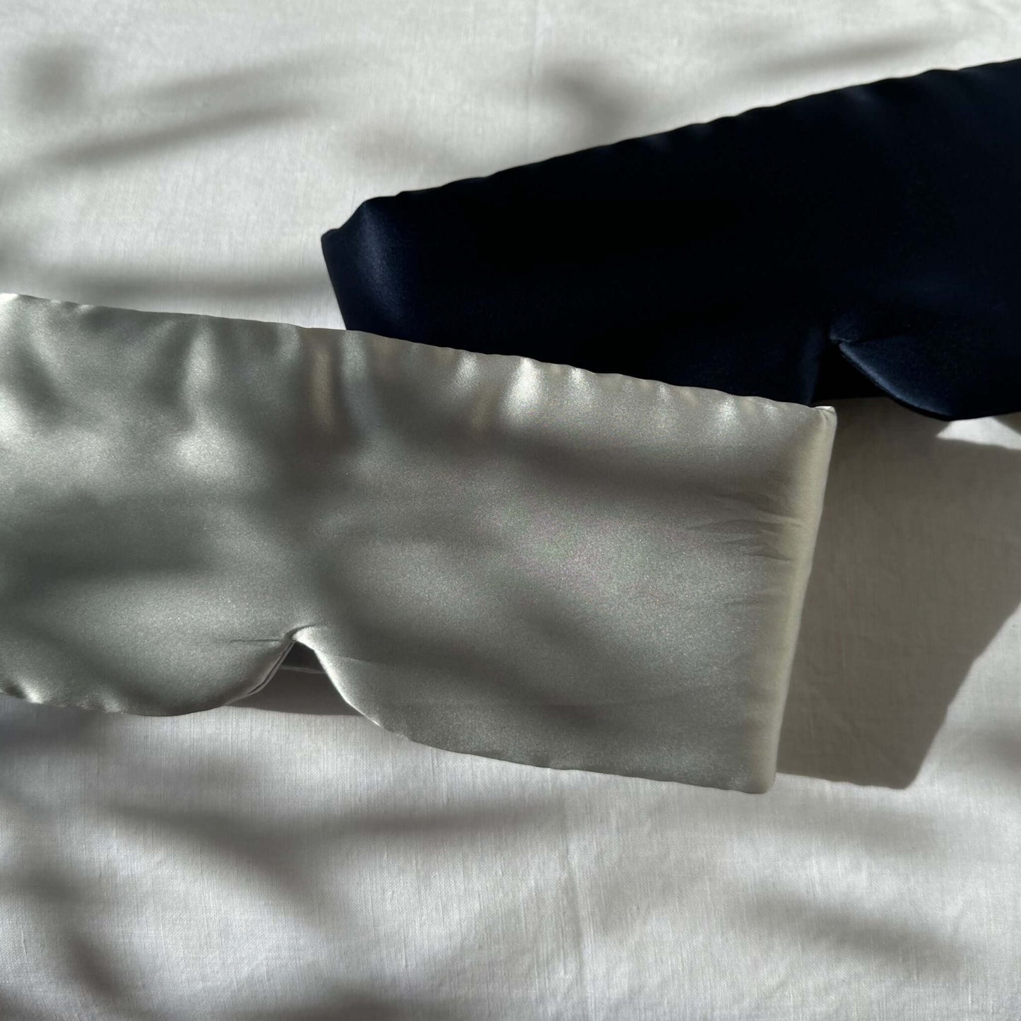 Navy silk sleep mask with adjustable strap